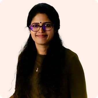 Professional headshot of DR. AKHILA KS, Managing Director